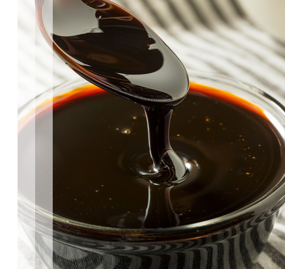 Molasses-Glazed Pork Belly Braised in Spiced Dark Rum