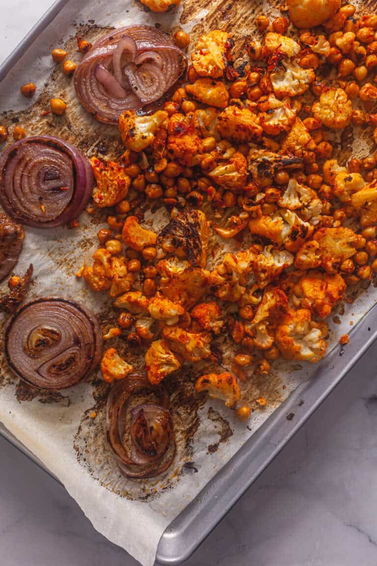 Sheet Pan Harissa-Spiced Cauliflower with Chickpeas and Tahini Drizzle