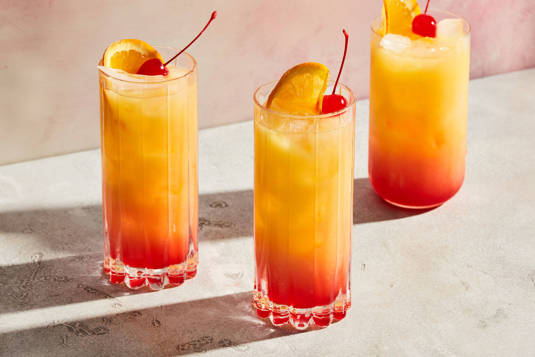 Tequila Sunrise with Hibiscus Rim