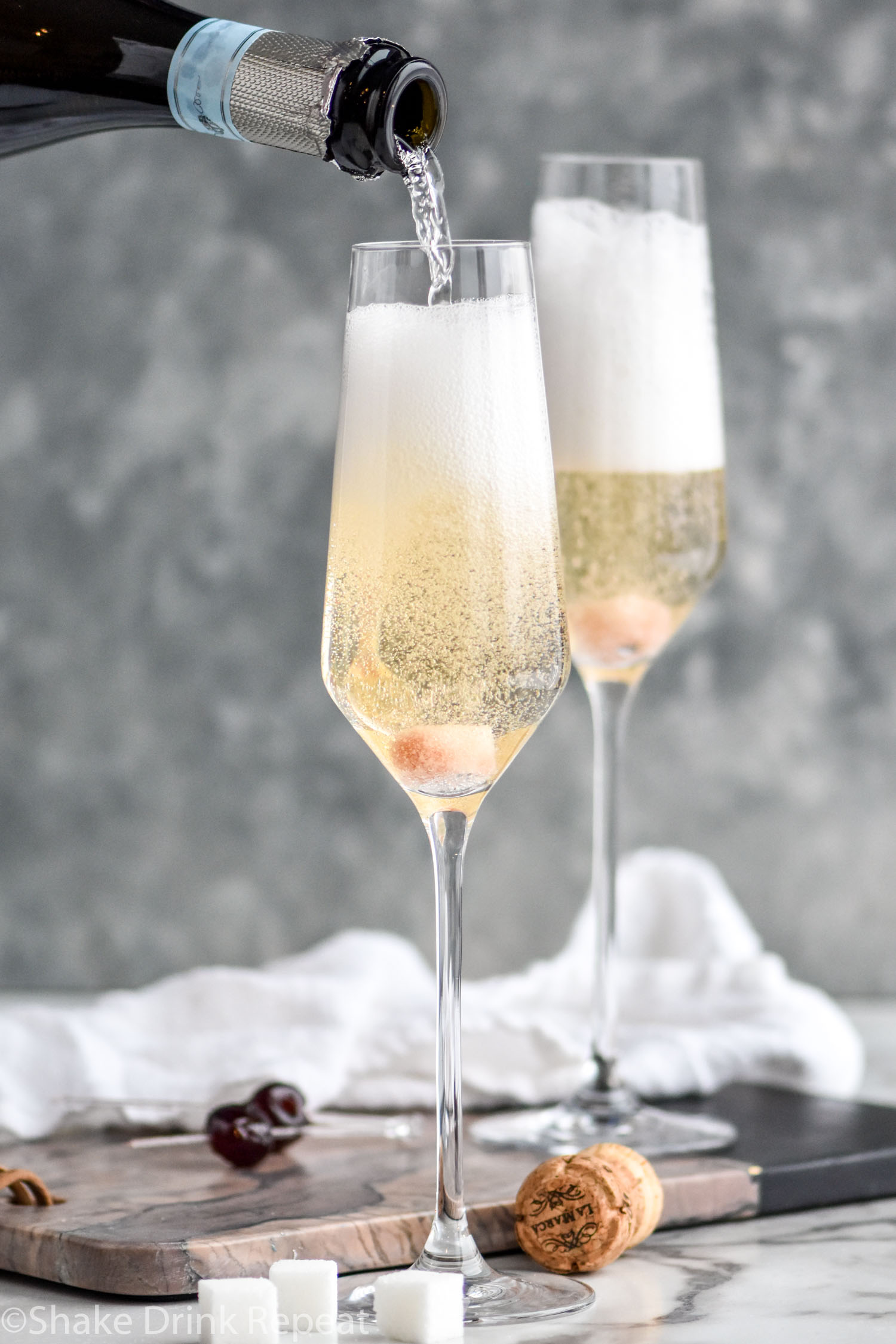 Ritz Fizz Champagne Cocktail with Orange and Gin