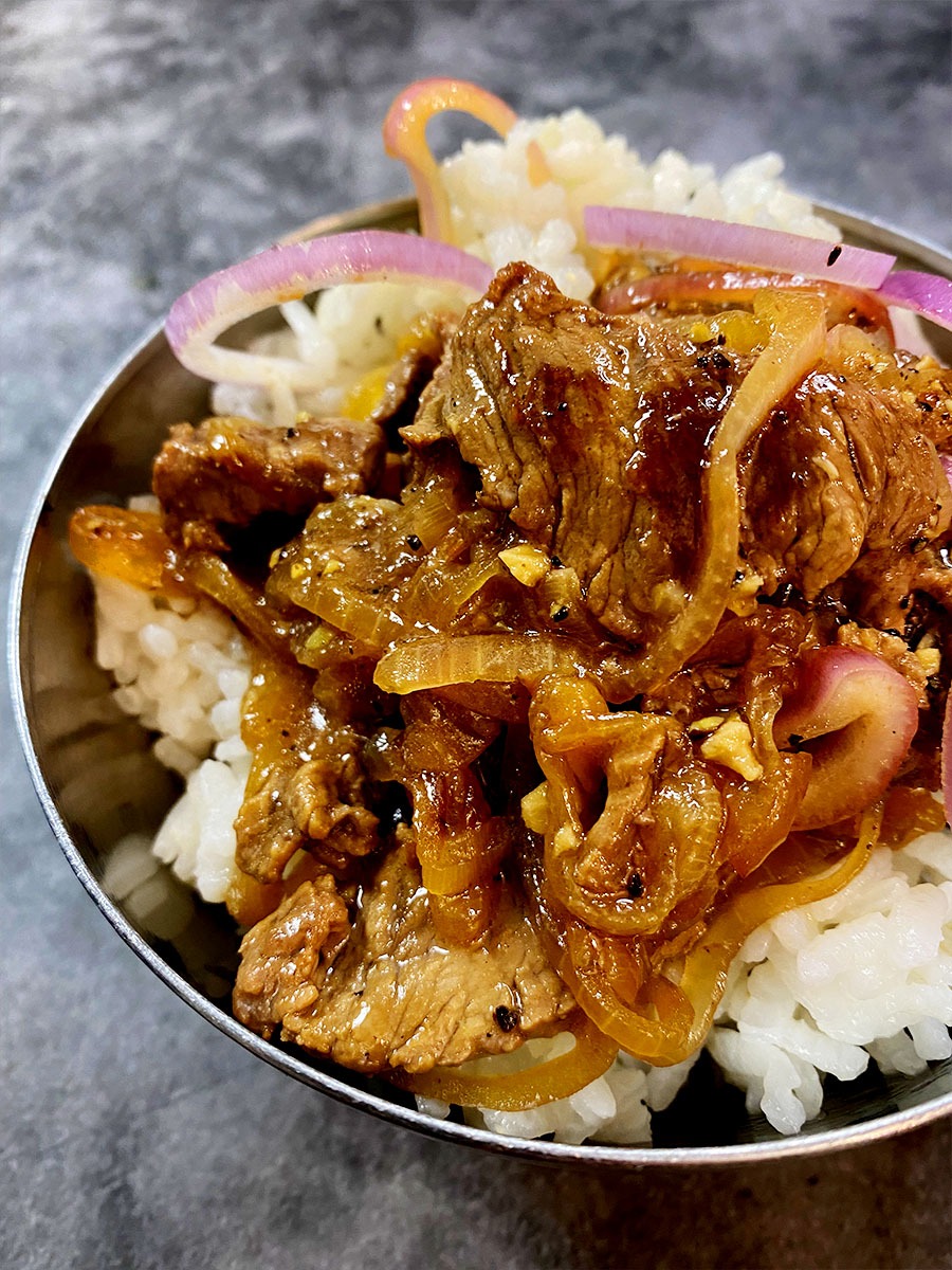 Soy-Marinated Beef Bistek with Caramelized Onions