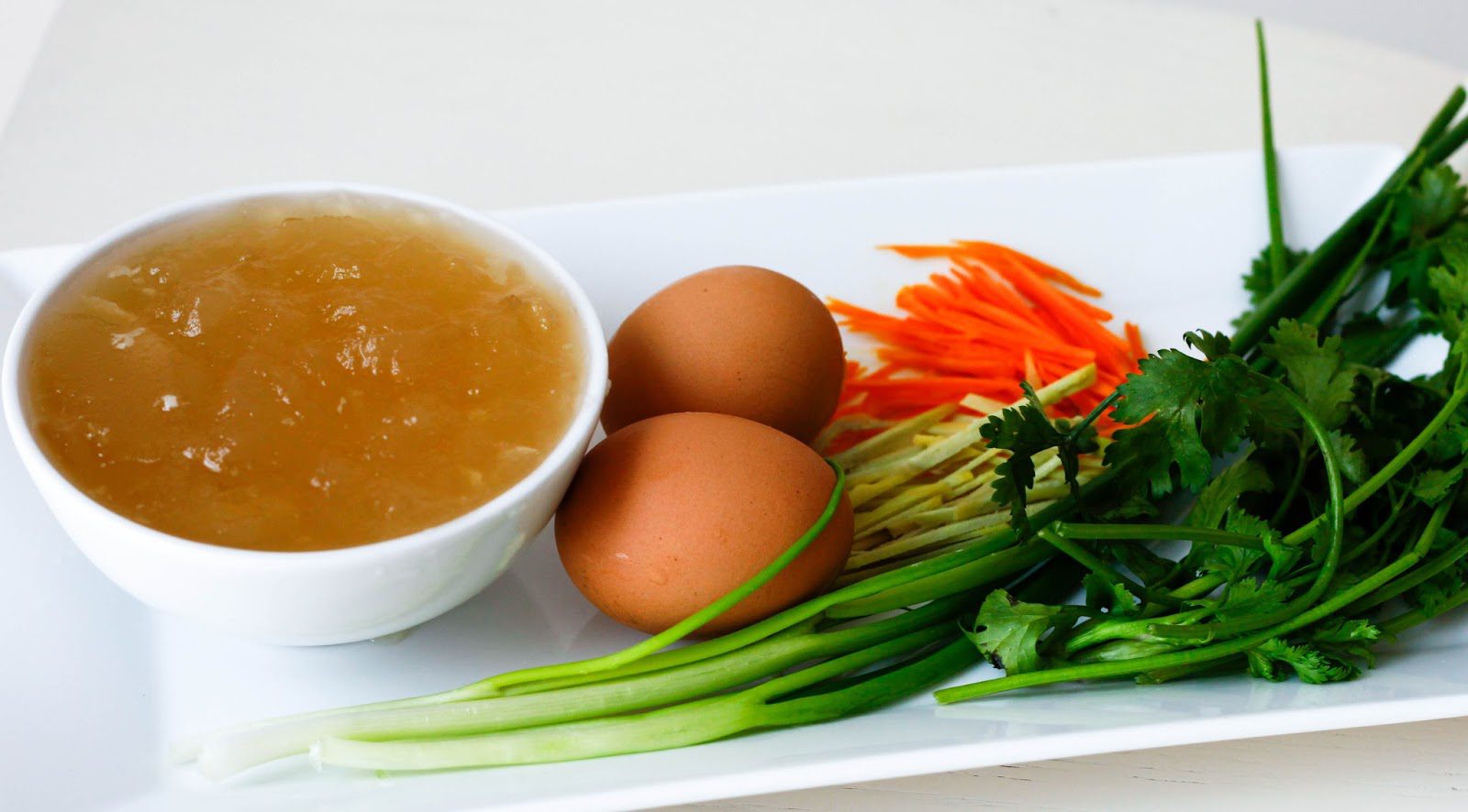 Ginger-Turmeric Bone Broth Soup with Bitter Greens