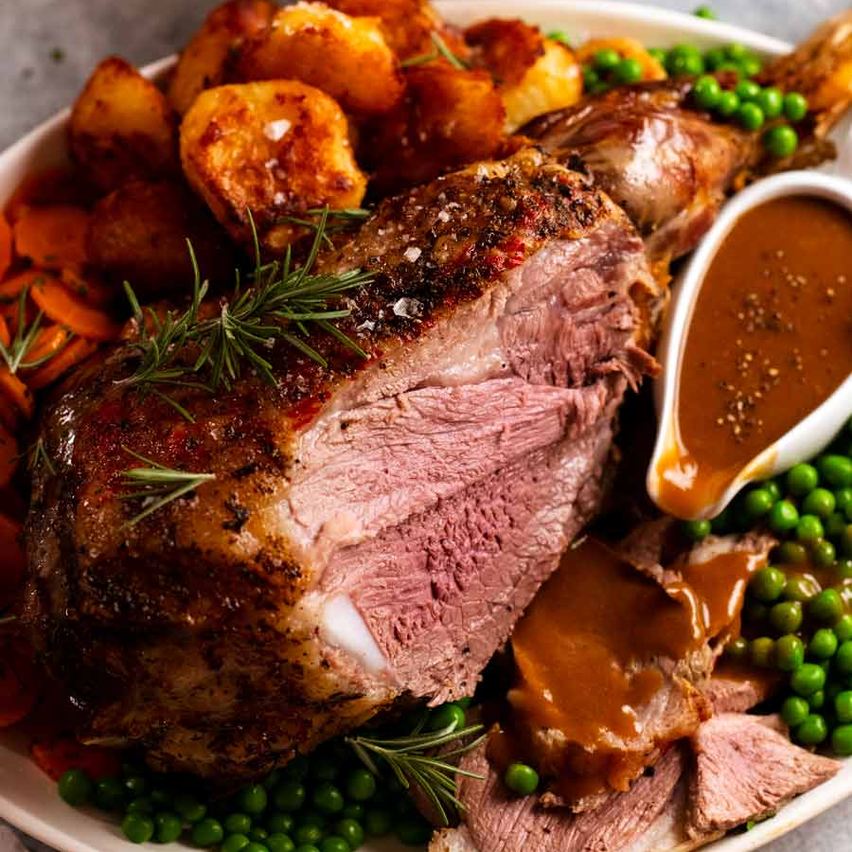 Slow-Roasted Greek Lamb Leg with Garlic Herb Carrots