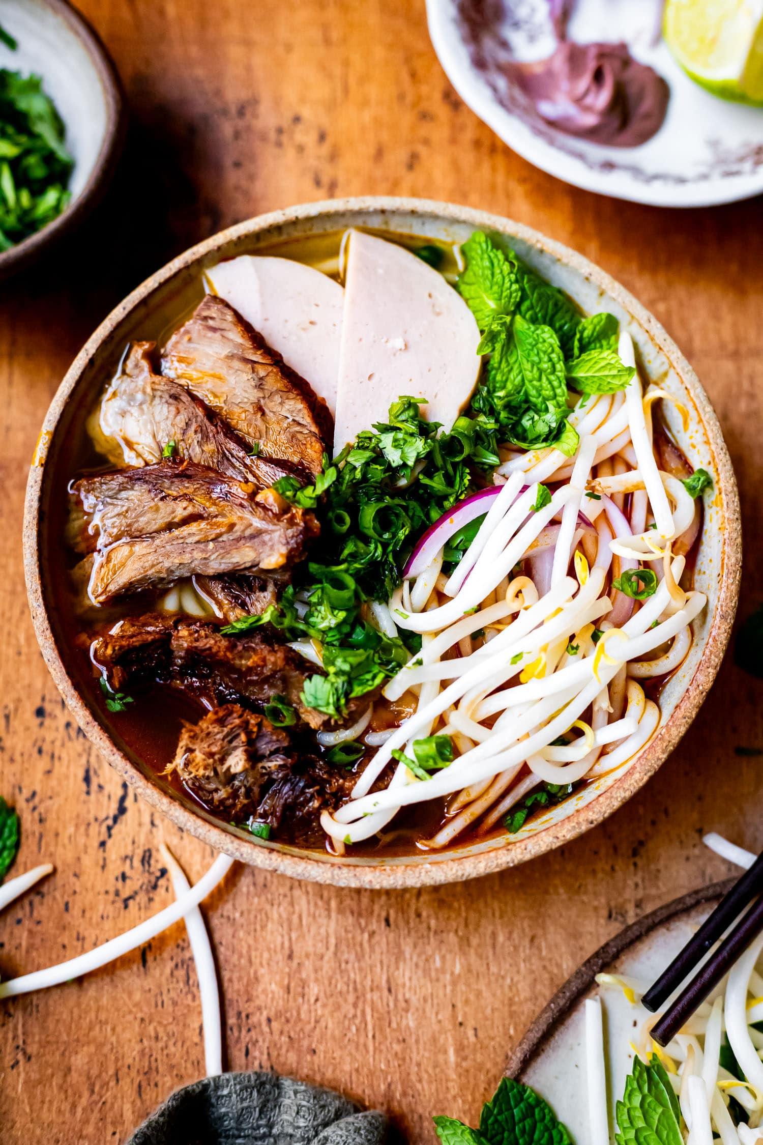 Vietnamese Pho Bo with Rich Beef Broth and Fresh Herbs