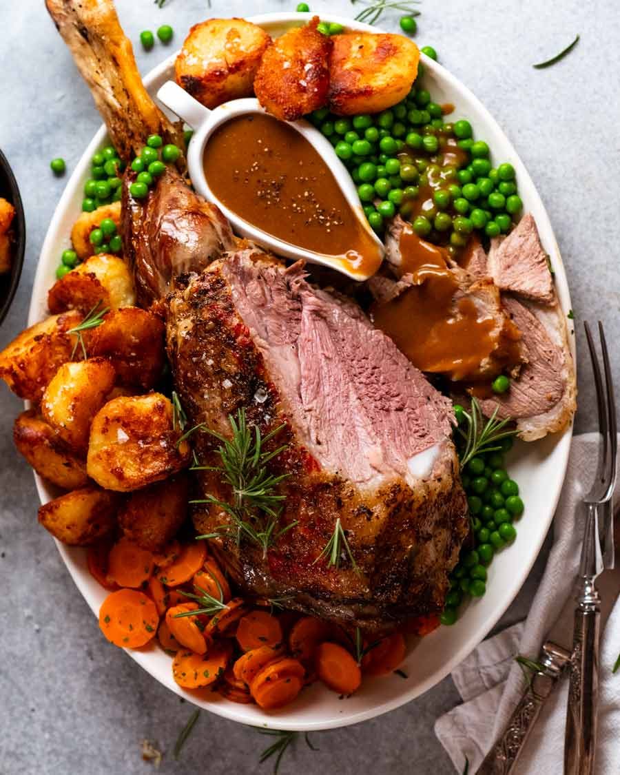 Slow-Roasted Mediterranean Lamb with Herb Jus