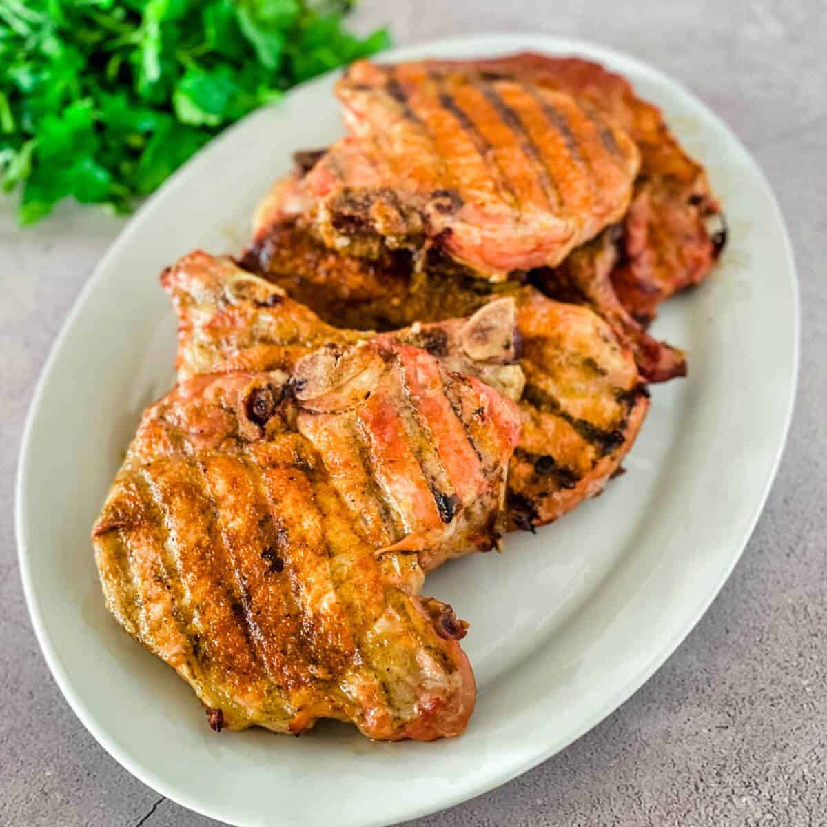 Grilled Pecan-Smoked Pork Chops with Texas Hill Country Peach Salsa