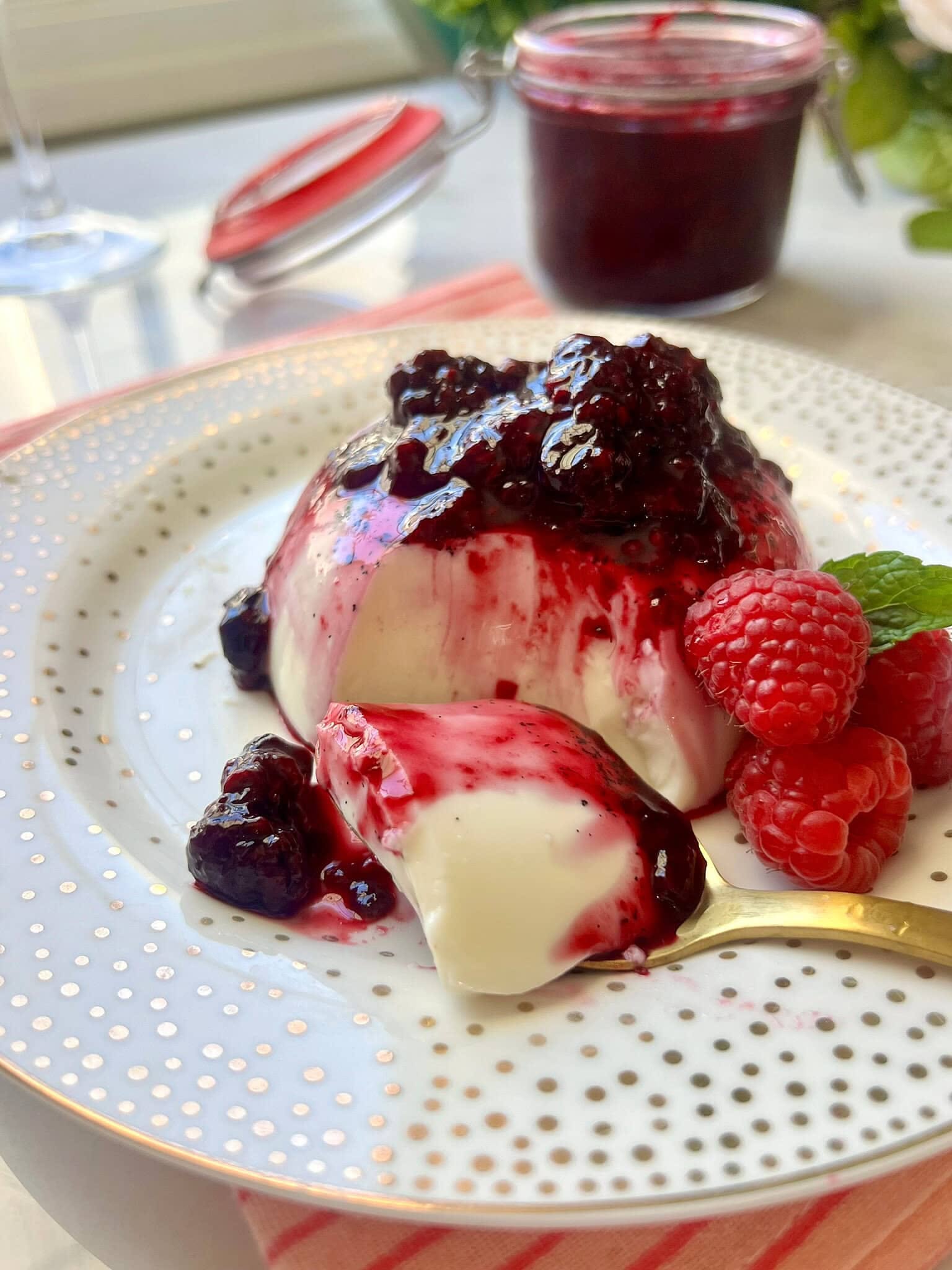 Classic Baked Vanilla Bean Panna Cotta with Berry Compote