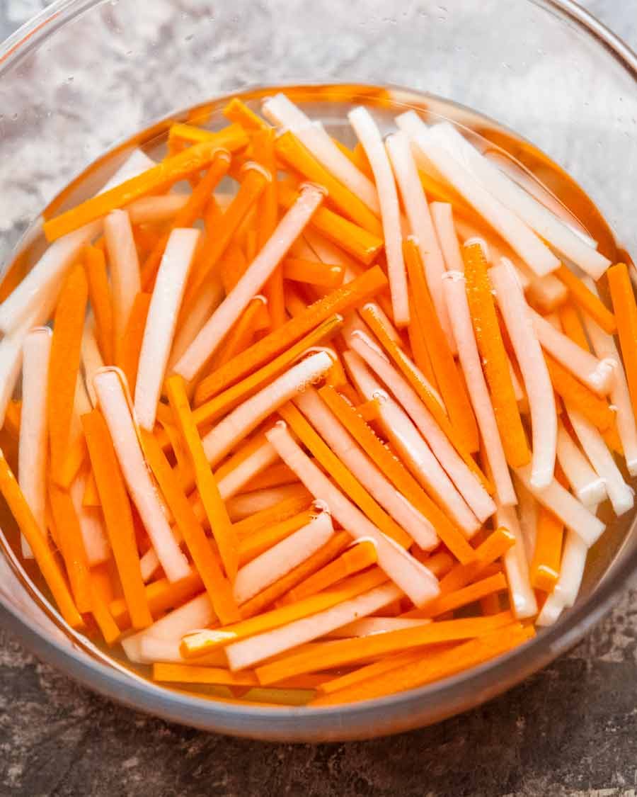 Steamed Pork Banh Bao with Pickled Carrots and Daikon