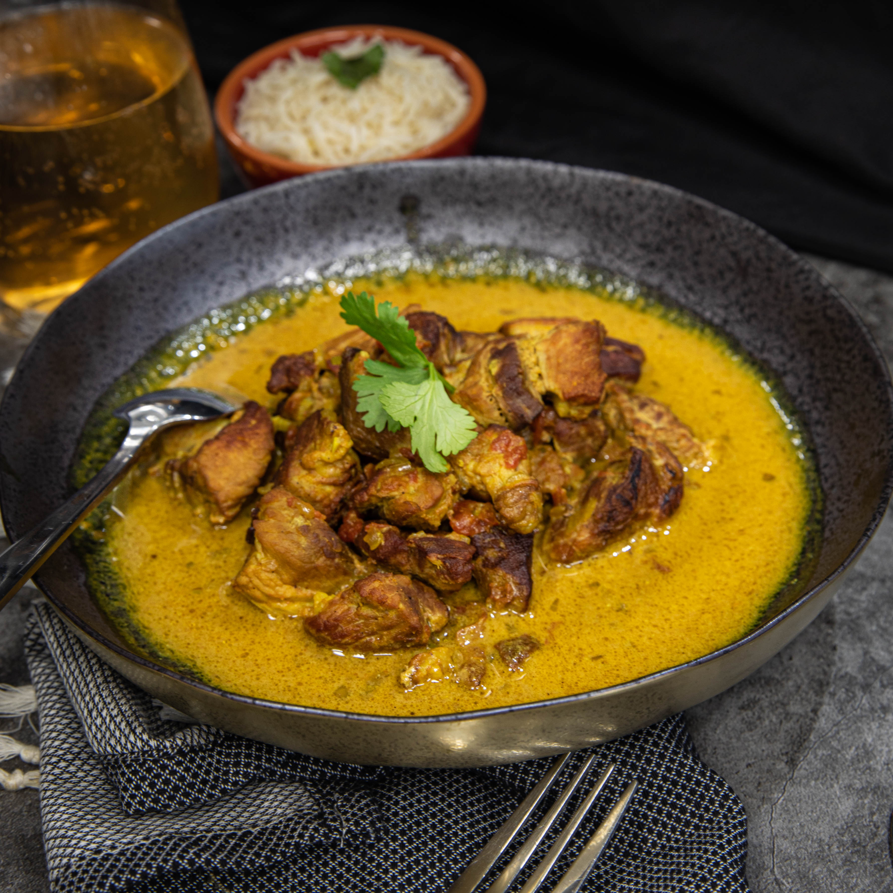 Slow-Cooked Black Pork Curry with Roasted Coconut Sambol