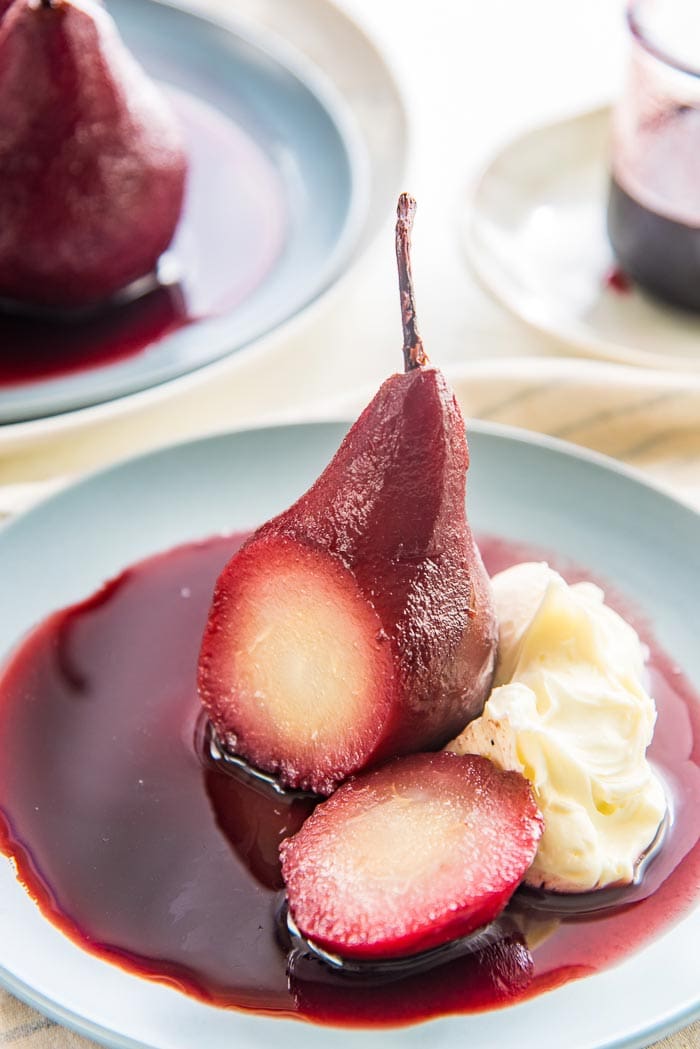 Red Wine and Pomegranate Poached Pears with Spiced Honey Drizzle