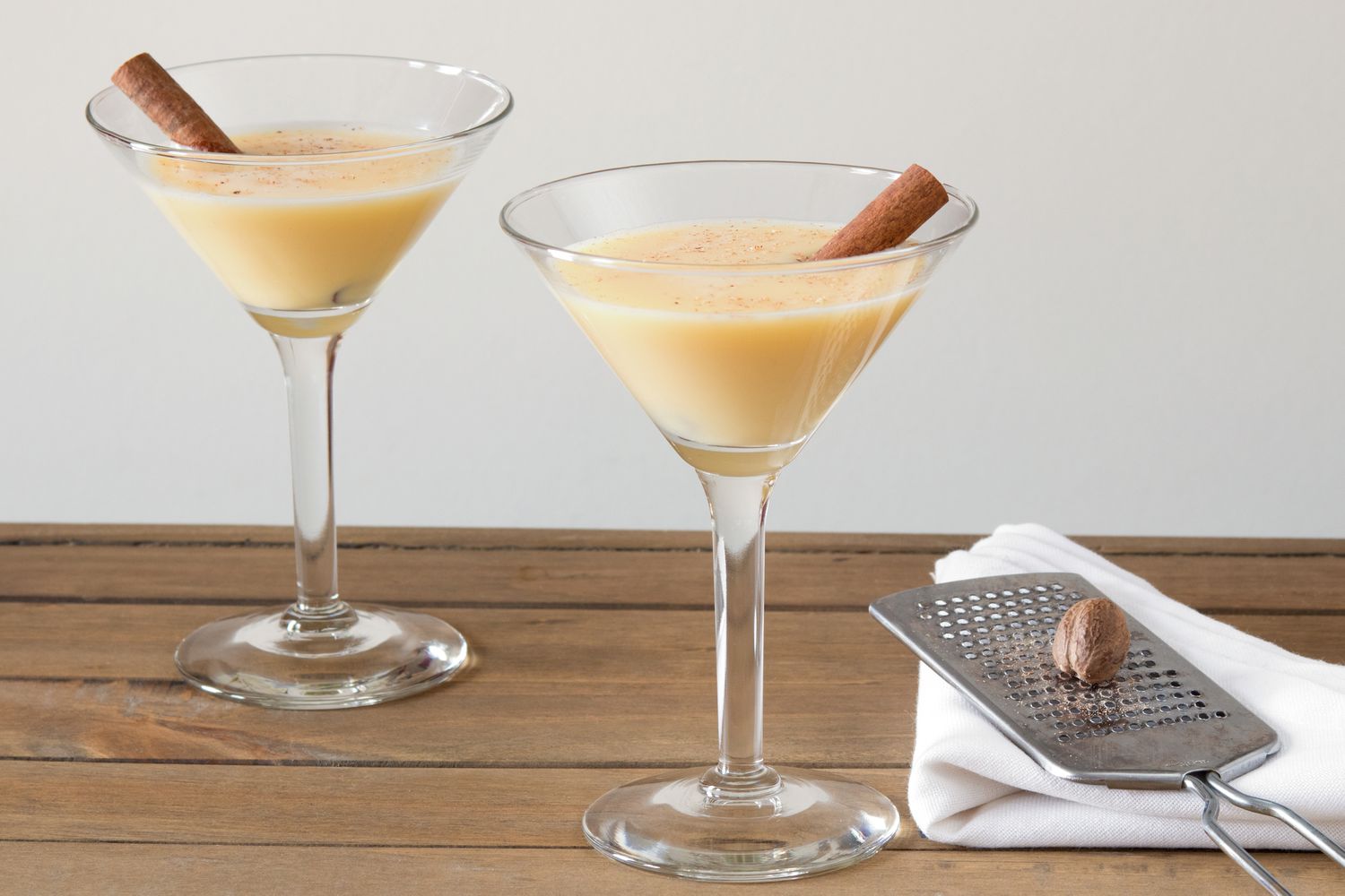 Shaken Amaretto Eggnog Martini with Cinnamon Stick