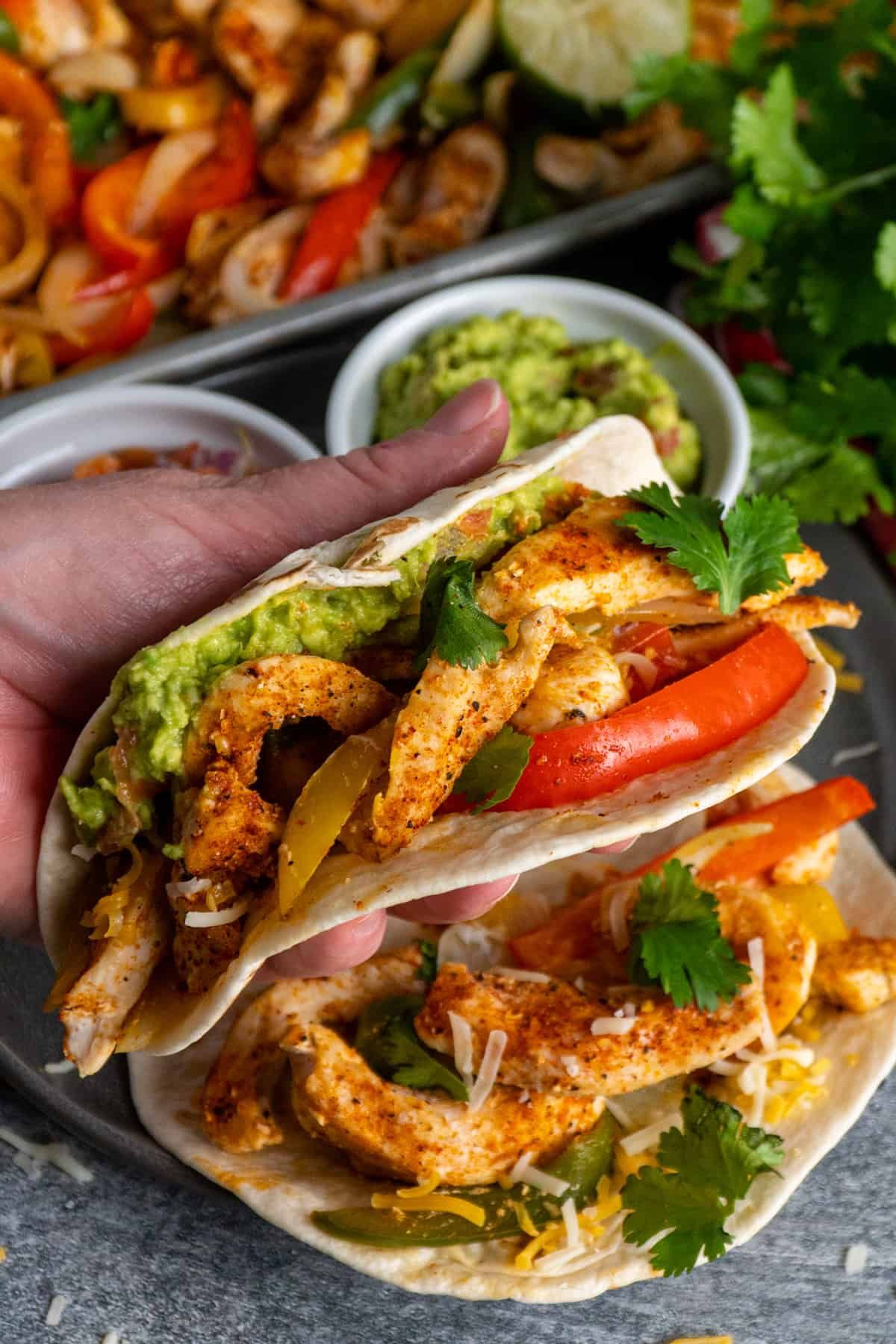 Maroon and White Layered Texas Sheet Pan Chicken Fajitas