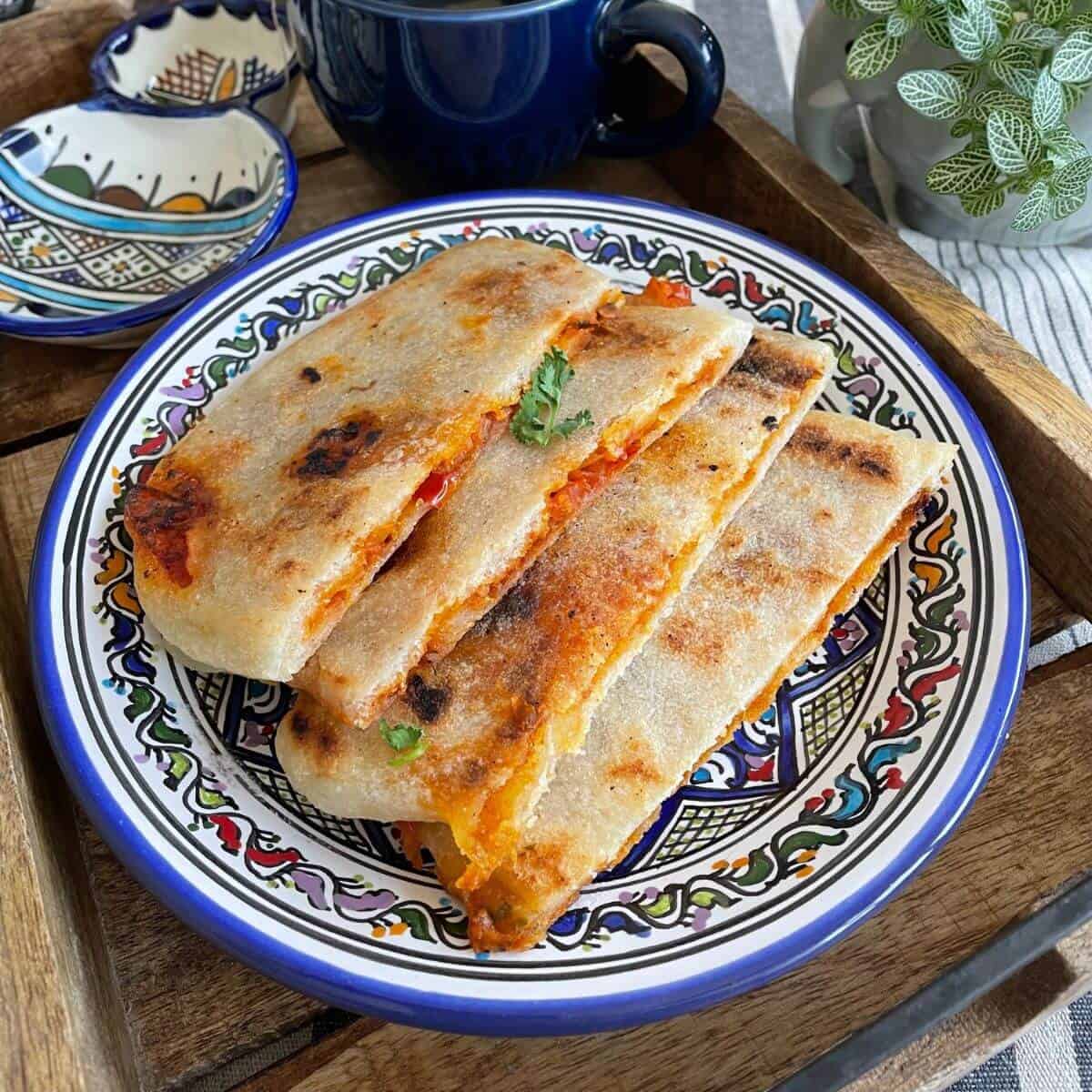 Pan-Fried Mahjouba Flatbread with Spiced Tomato Filling