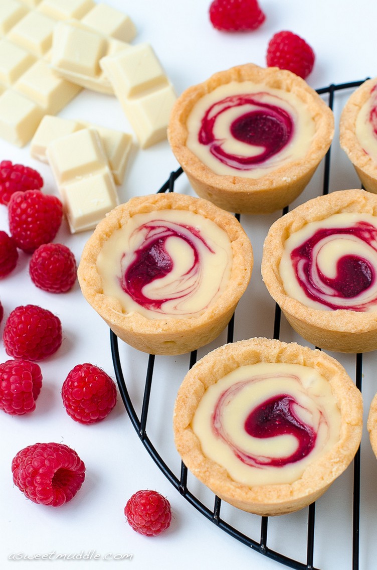 Mini Chocolate-Dipped Raspberry Almond Tartlets