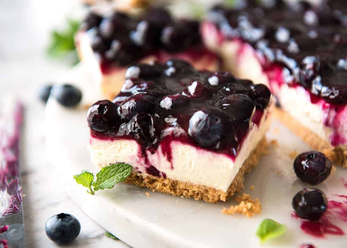 Blueberry and Strawberry Layered Cheesecake Bars