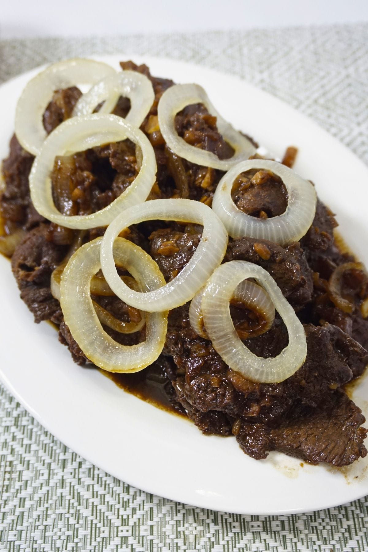 Soy-Calamansi Marinated Beef Bistek with Caramelized Onions