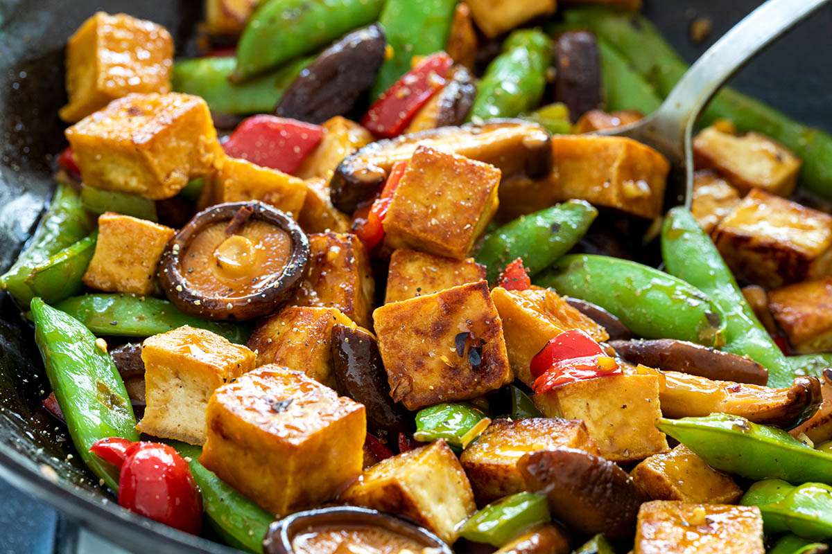 Spicy Tofu Stir-Fry with Rice Noodles and Snap Peas