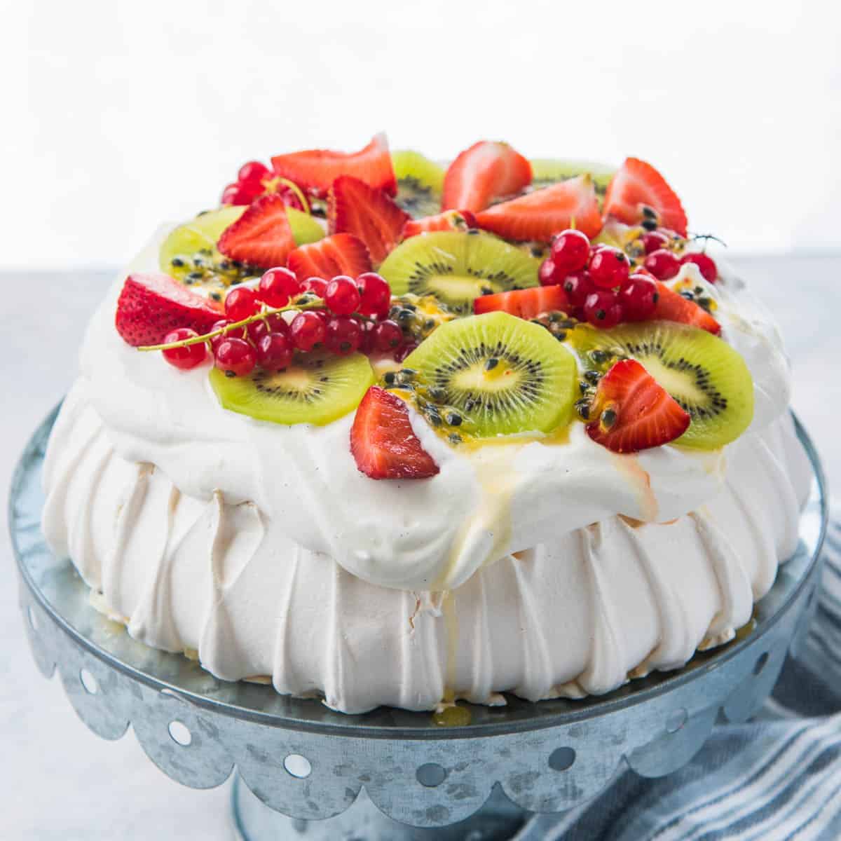 Pavlova with Macadamia-Crusted Whipped Cream and Passionfruit