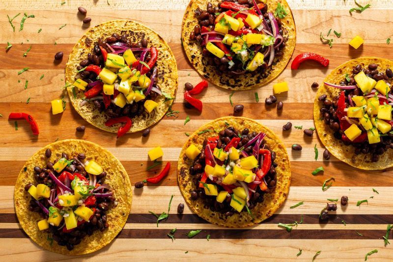 Savory Plantain and Black Bean Tacos with Spicy Mango Salsa