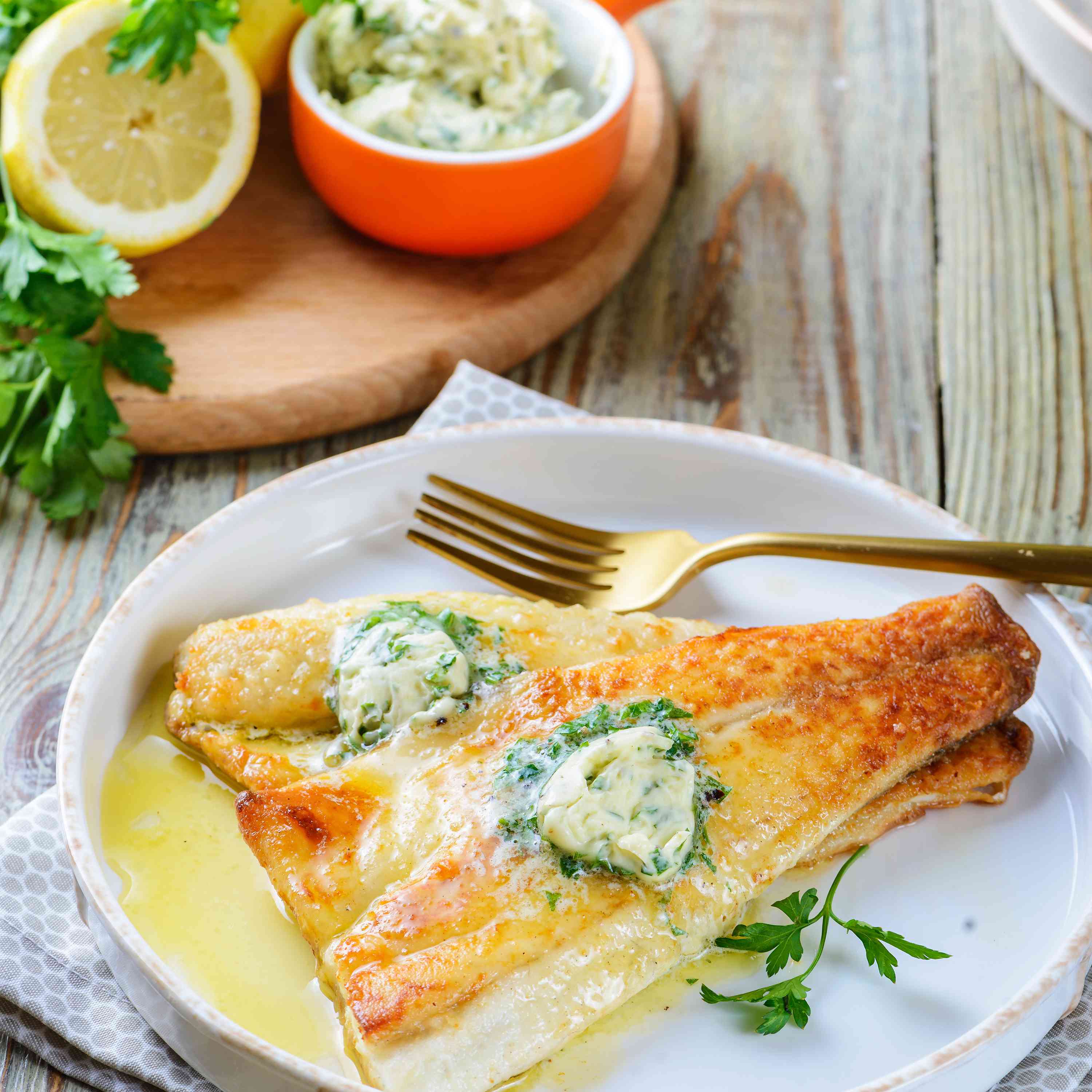 Smoked Sea Bass with Citrus and Herb Butter