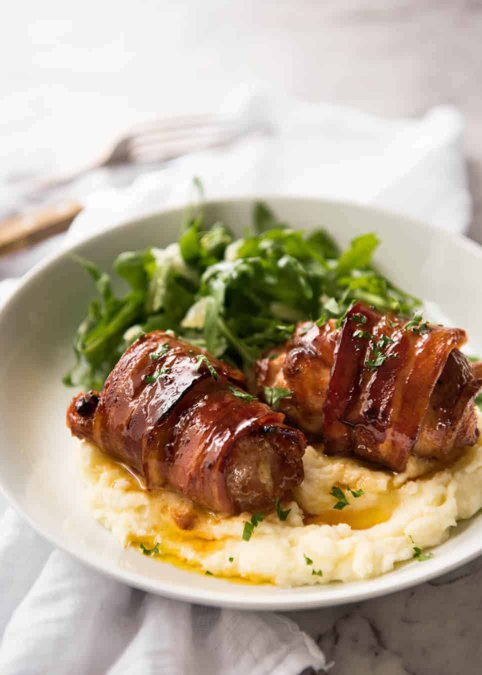 Baked Bacon-Wrapped Chicken Thighs with Garlic Herb Butter