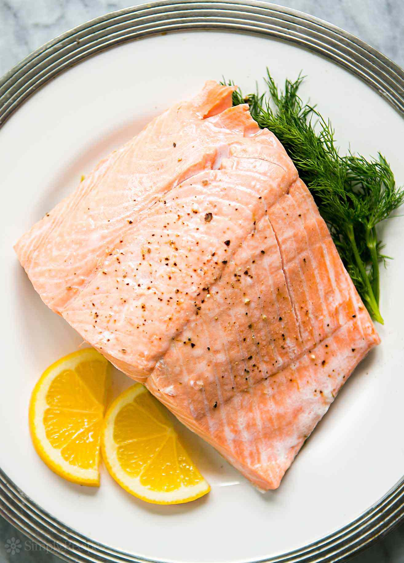 Ginger-Turmeric Poached Salmon with Sautéed Spinach