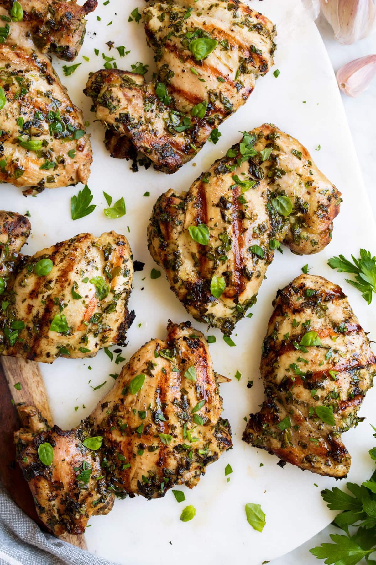 Grilled Citrus-Tamarind Chicken Thighs with Herb Yogurt Sauce