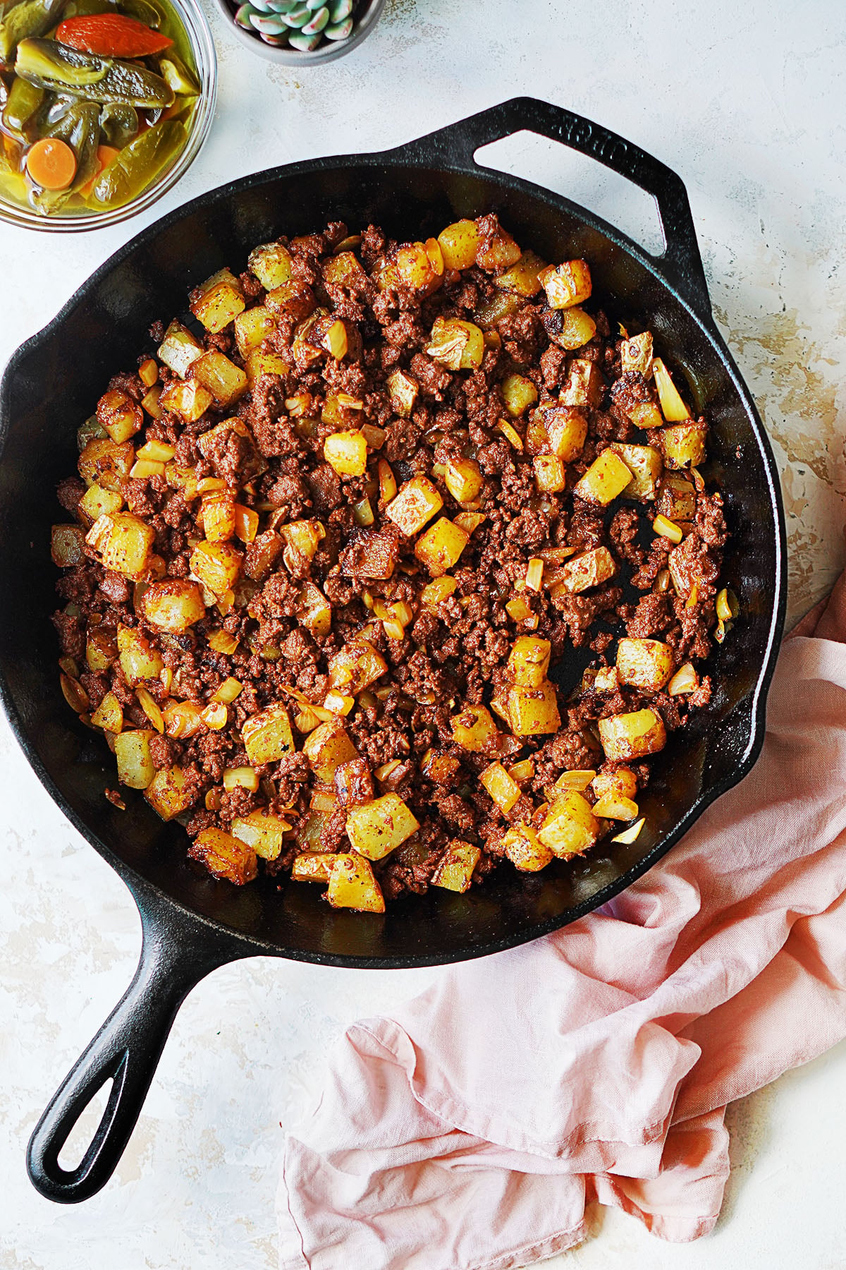 Pan-Fried Goan Chorizo with Spiced Potatoes and Onions