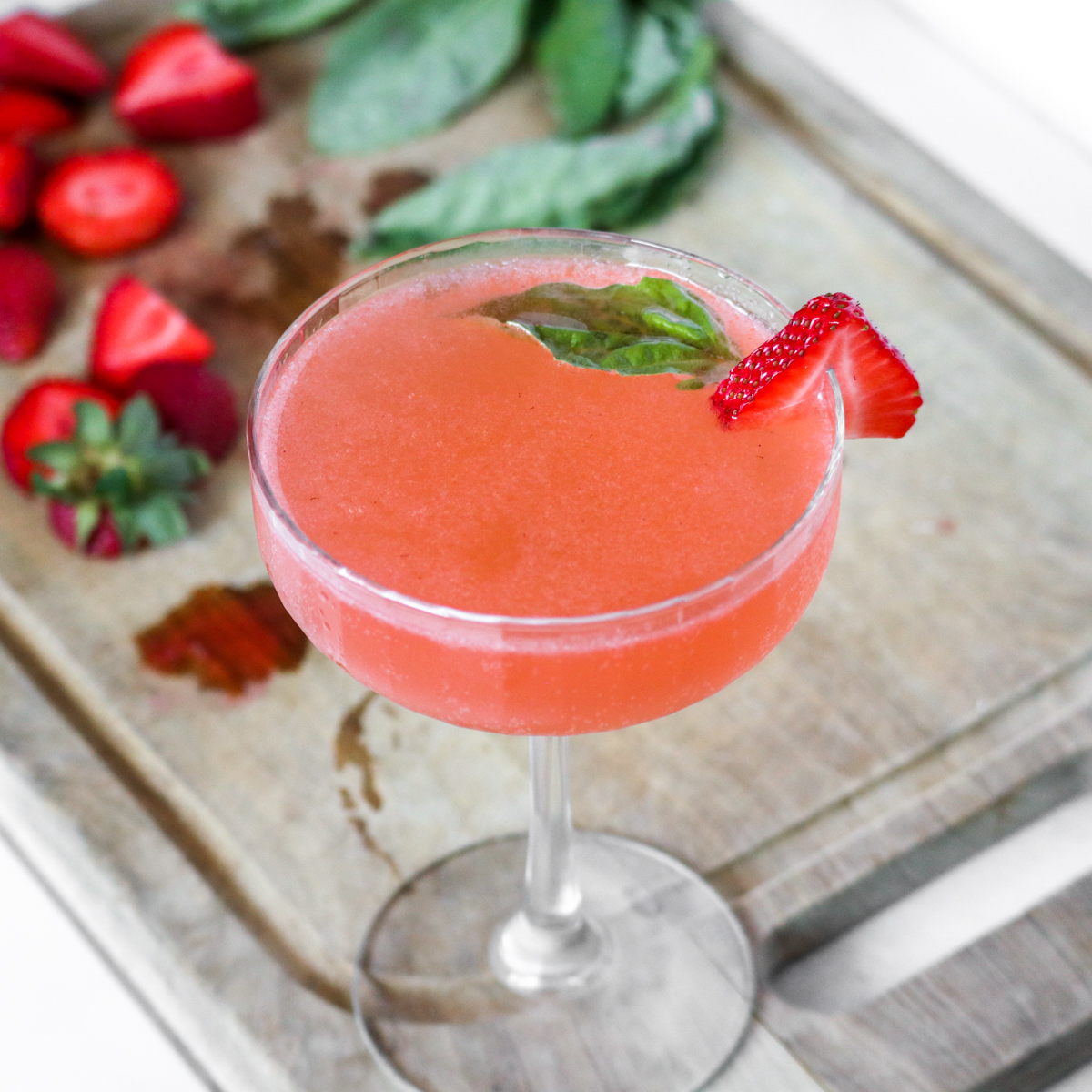 Seasonal Berry Martini with Fresh Basil and Lemon