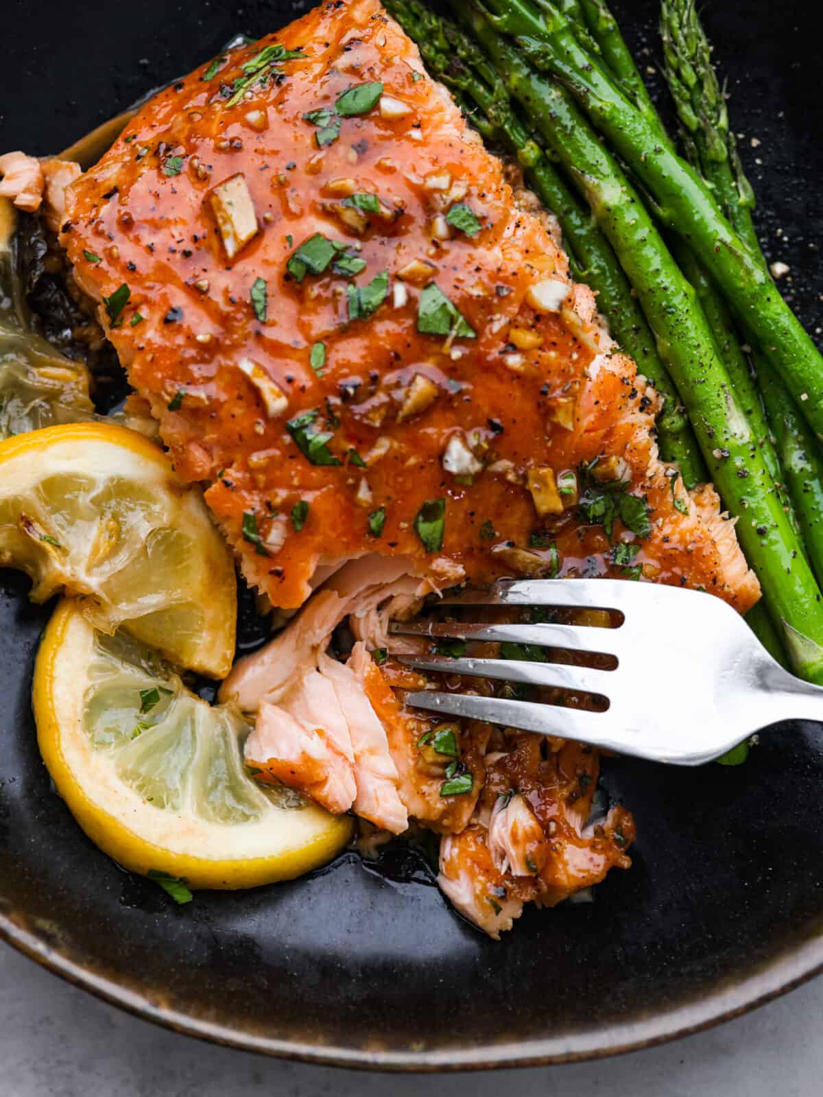 Sweet and Tangy Citrus-Glazed Salmon with Garlic Sautéed Greens