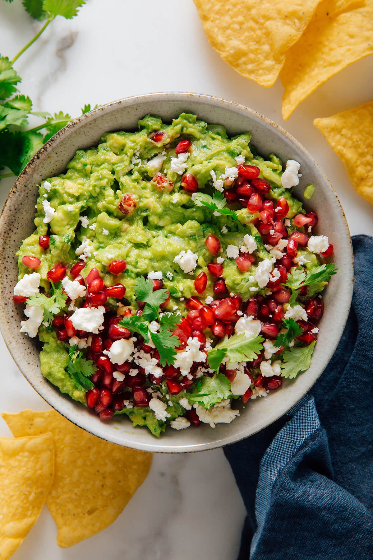 Quick Pomegranate Guacamole with Feta and Cilantro