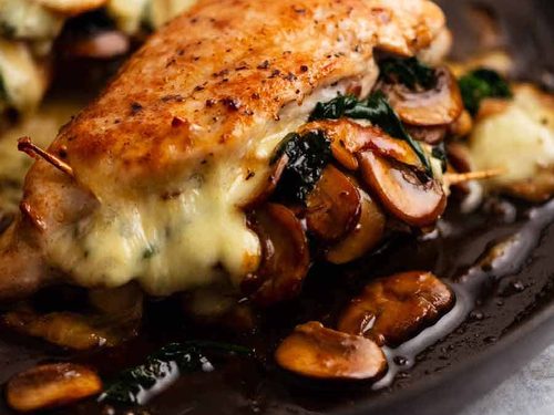 Cheese-Stuffed Chicken Thighs with Spinach and Mushroom Sauce