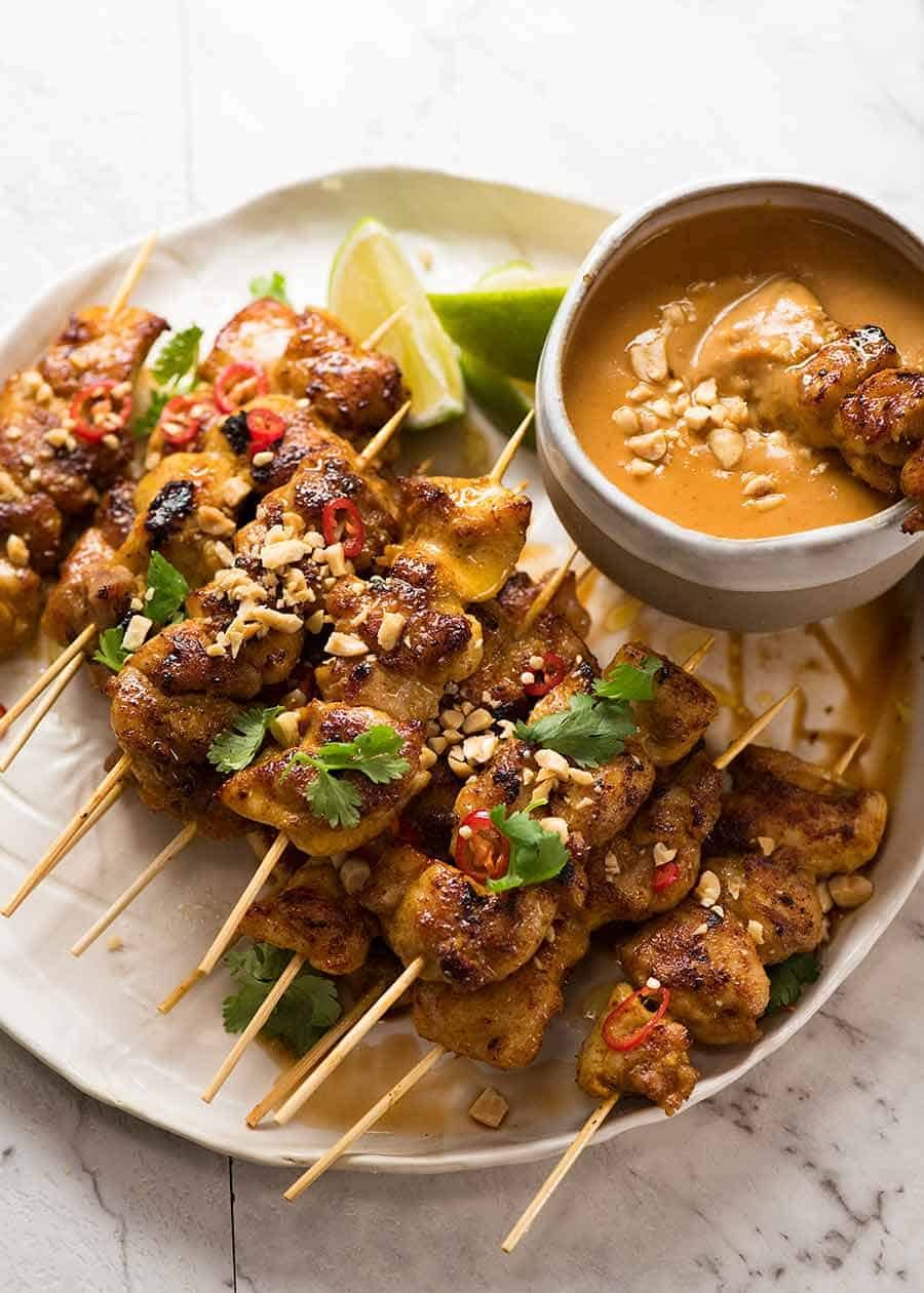 Grilled Tamarind-Glazed Pork Skewers with Spiced Peanut Sauce