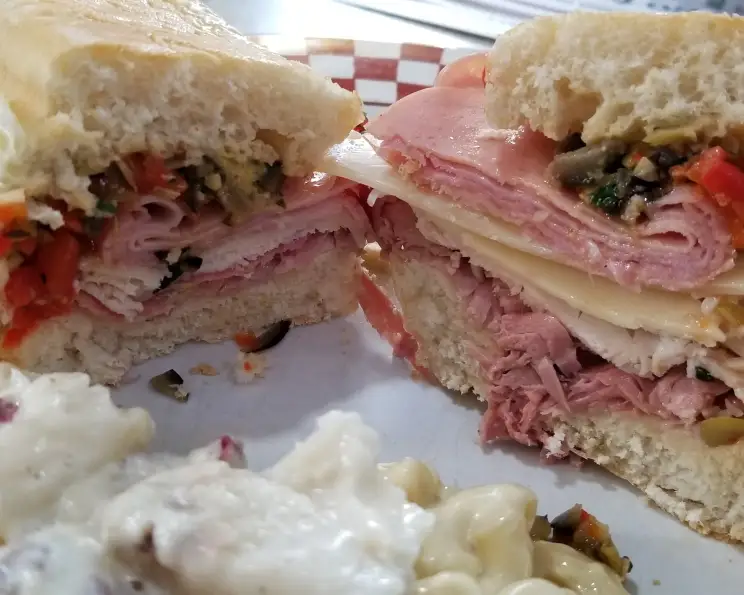 Spicy Muffuletta Sandwich with Olive Salad and Genoa Salami