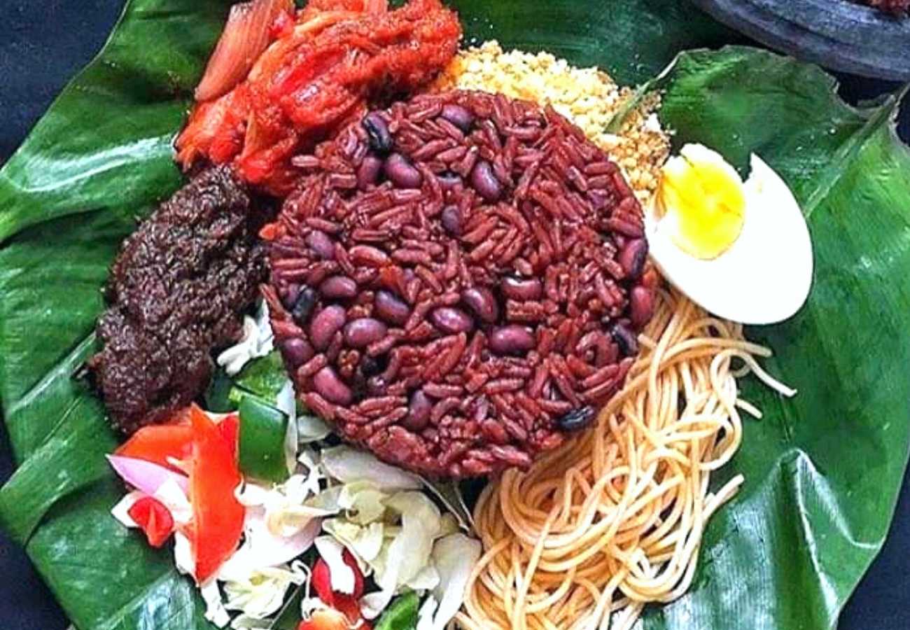 Waakye-Inspired Rice and Beans Pilaf with Red Sorrel Leaves
