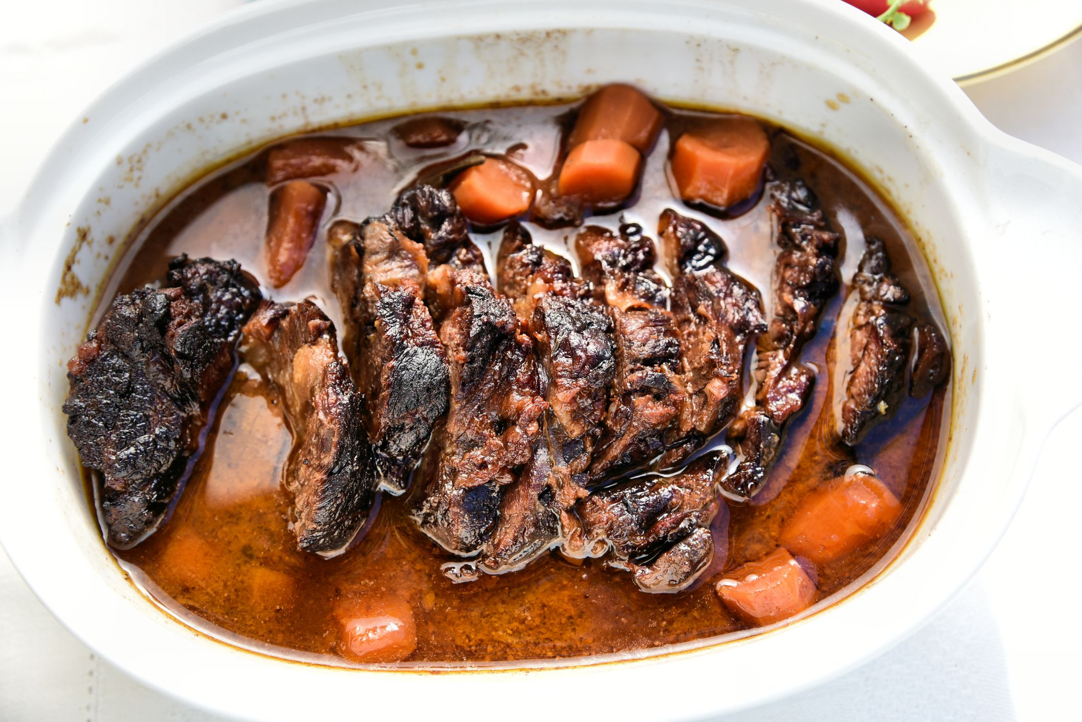 Slow-Cooked Beef Brisket with Caramelized Onions and Garlic