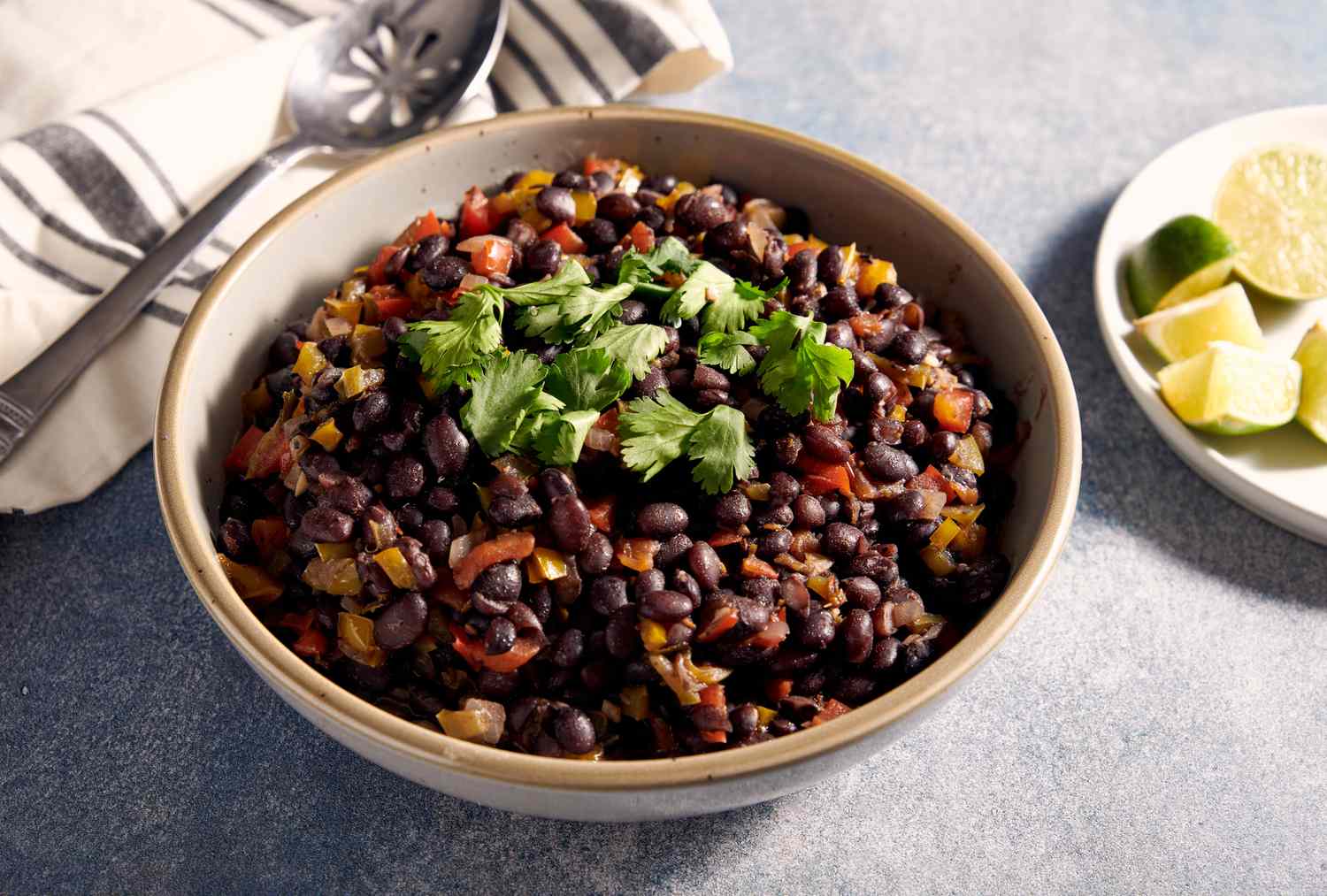 Dominican-Style Black Bean and Rice Bowl with Avocado Crema