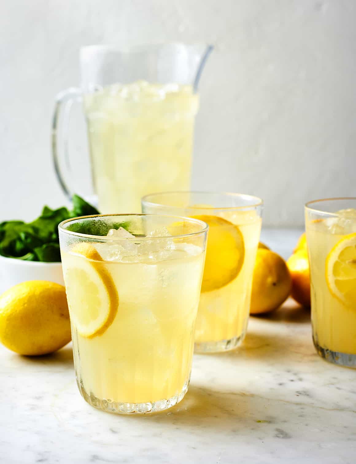 Icy Herb-Infused Lemonade with Frozen Citrus Cubes