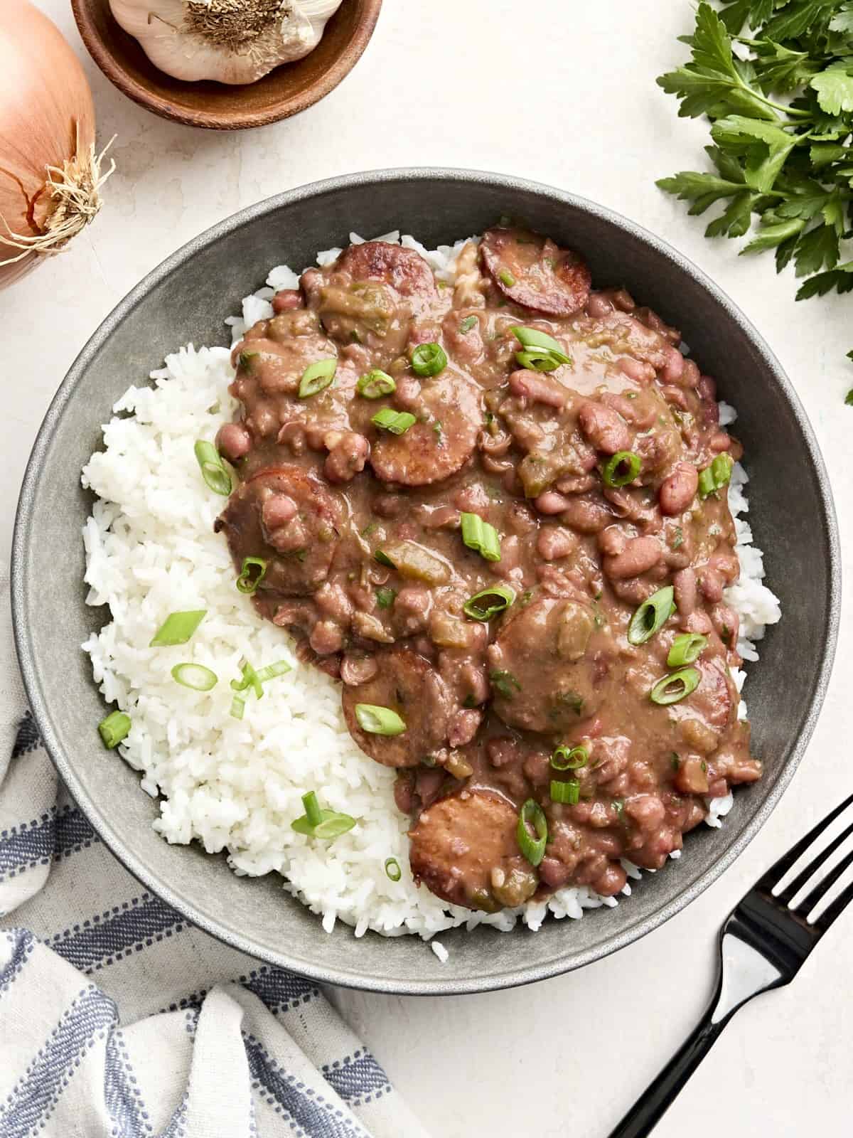 Creole-Spiced Red Beans and Brown Rice Bowl with Andouille and Greens
