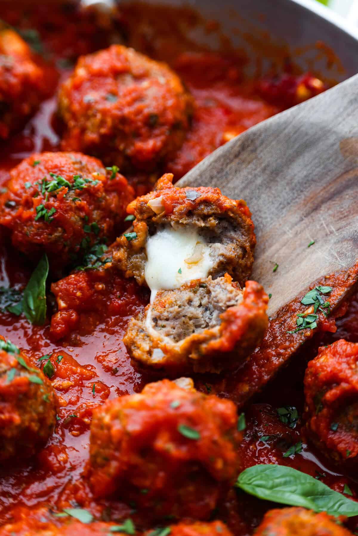 Cheese-Stuffed Keto Meatballs with Garlic Butter Sauce