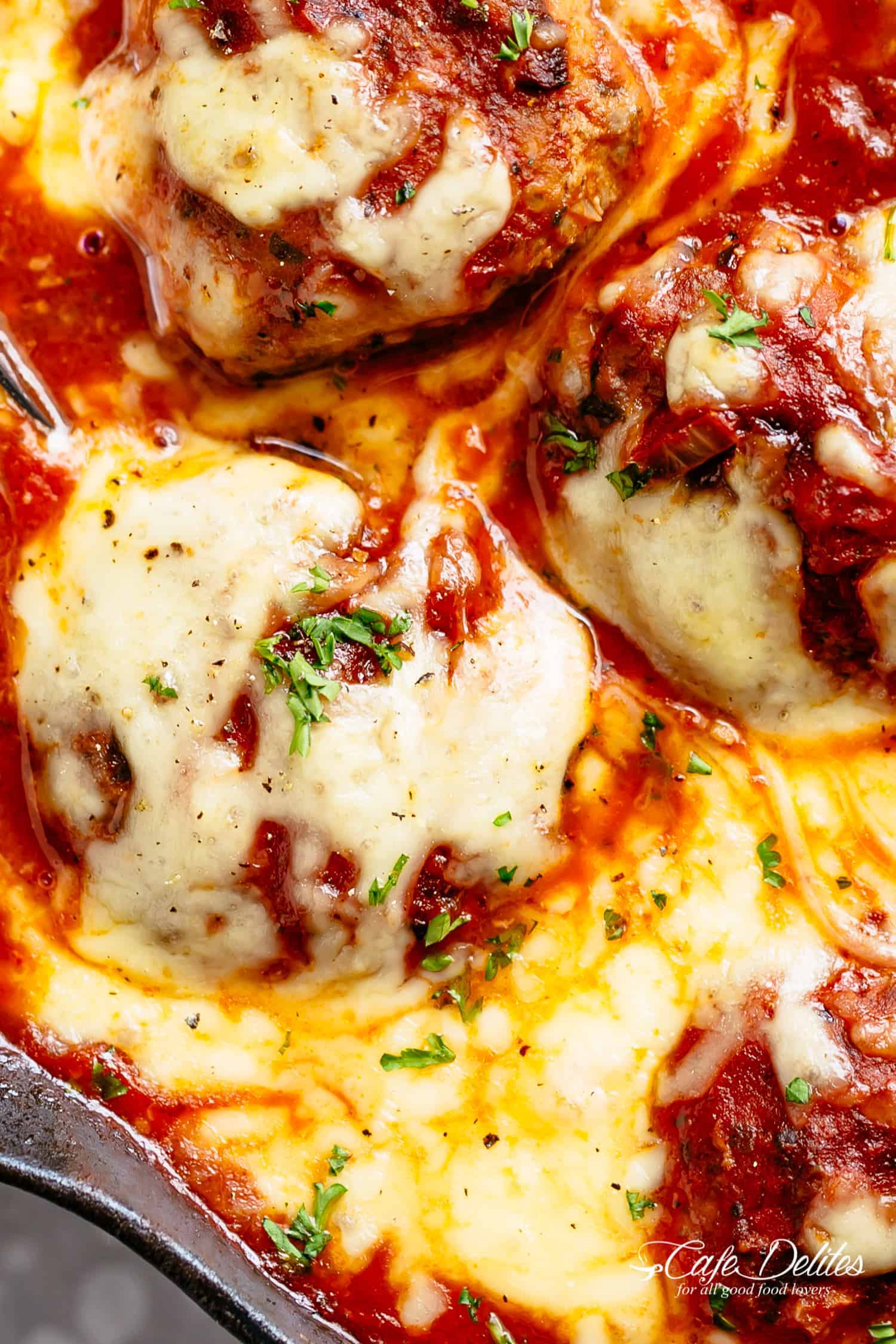 Cheese-Stuffed Pork Meatballs in Tomato Basil Sauce