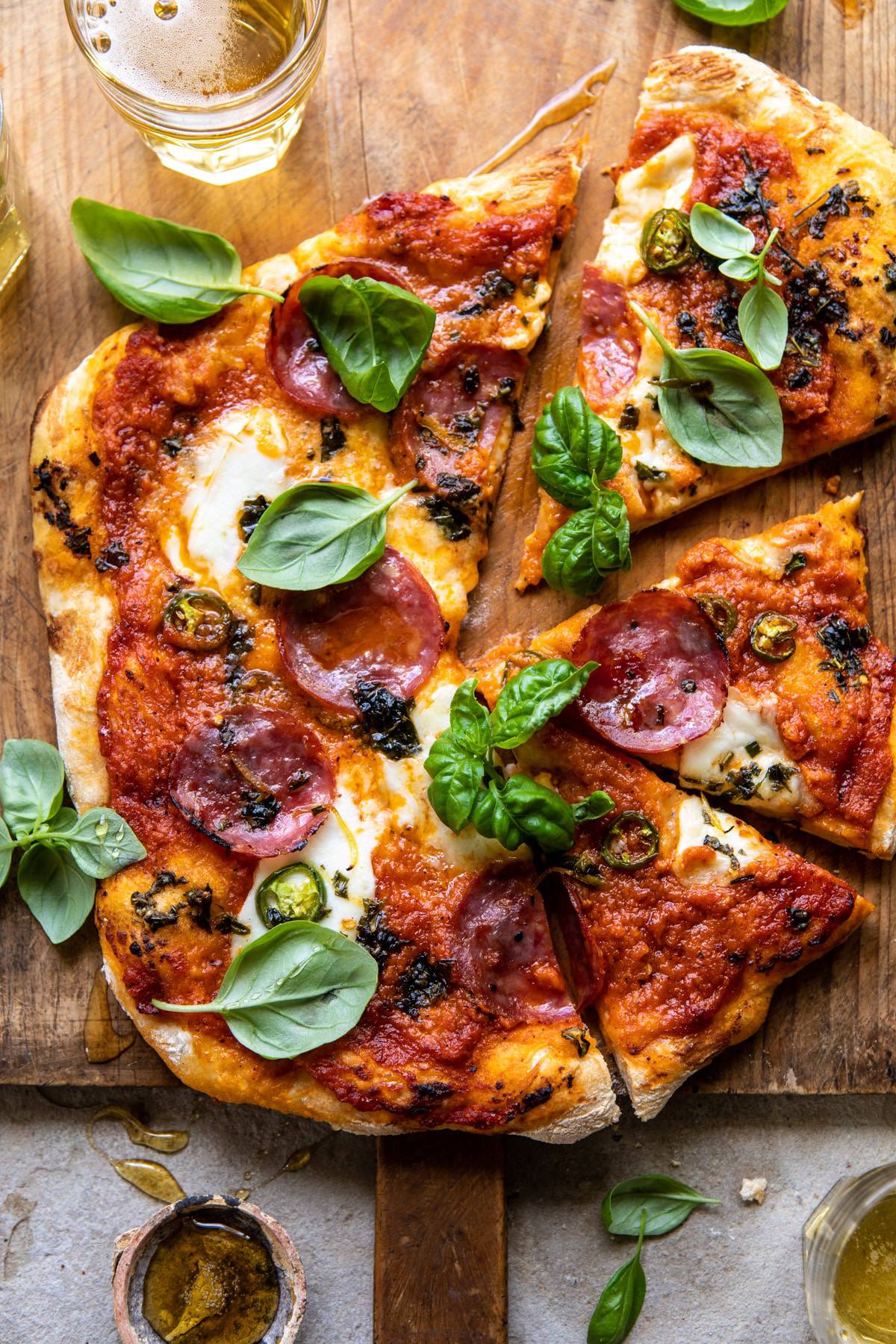 Wood-Fired Thin Crust Pizza with Tomato, Mozzarella, and Basil