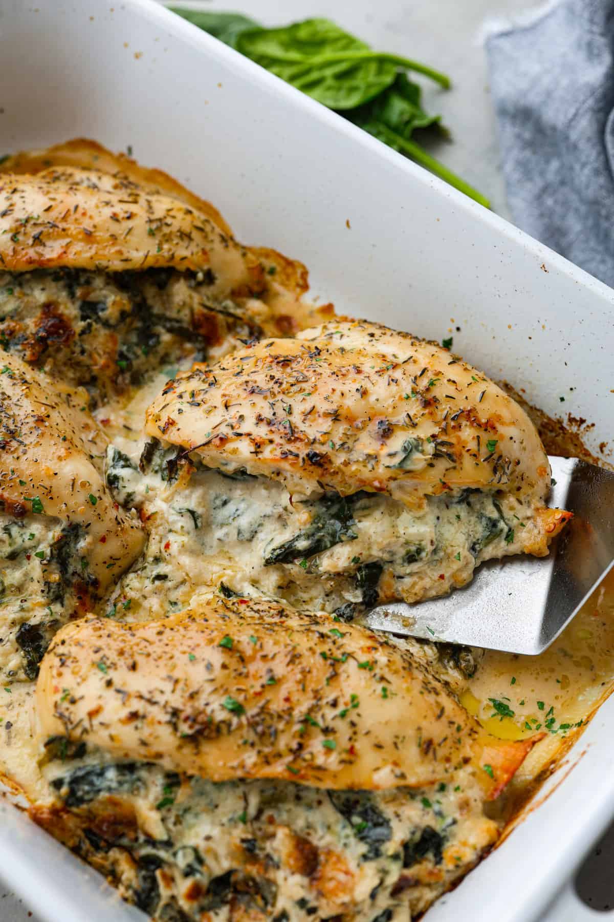 Cheesy Spinach-Stuffed Chicken Thighs with Garlic Butter