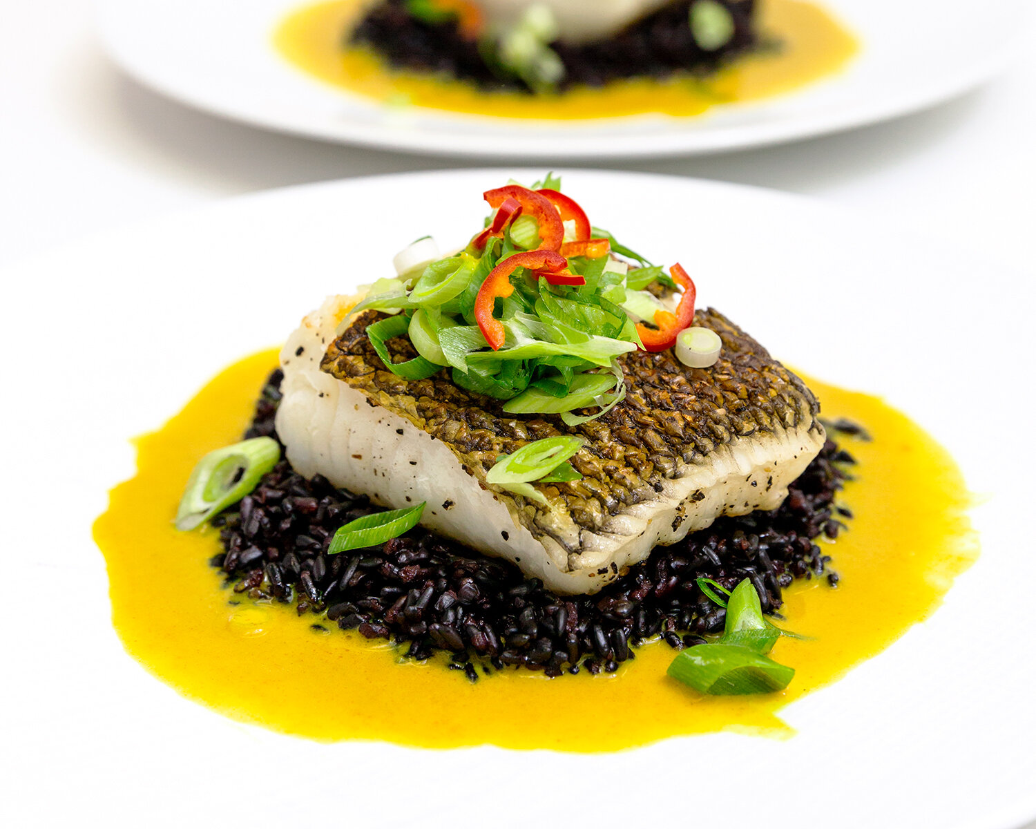 Pan-Seared Sea Bass with Coconut Milk and Dendê Oil Sauce