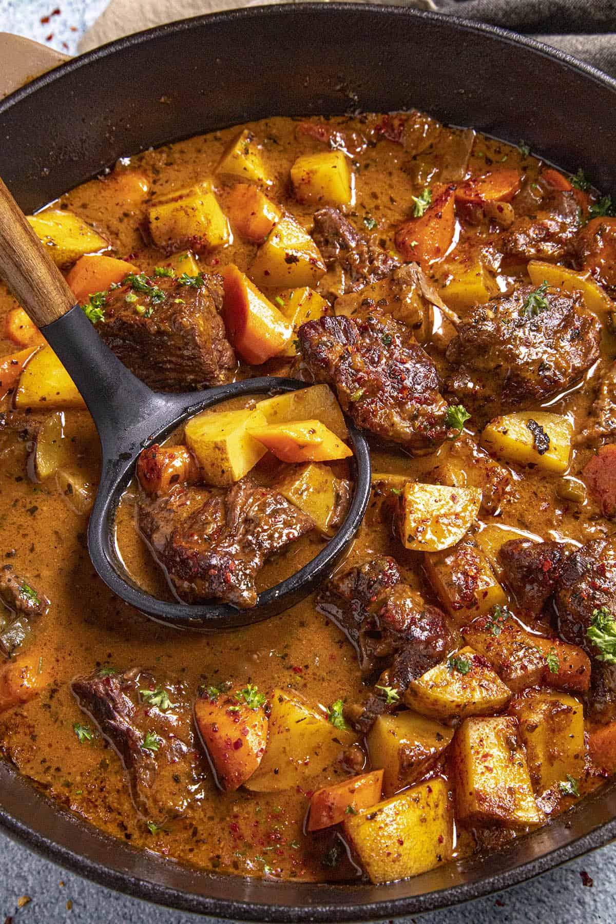 Slow-Cooked Spicy Beef Stew with Sweet Potatoes and Peppers