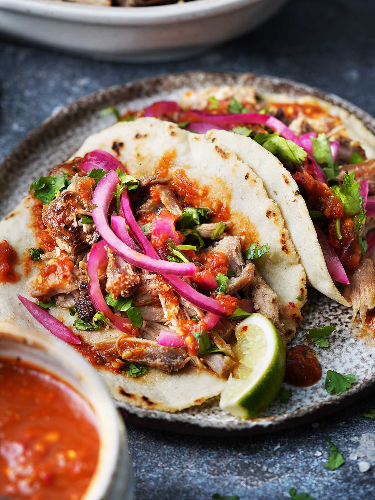 Slow-Cooked Carnitas Tacos with Citrus and Pickled Onions