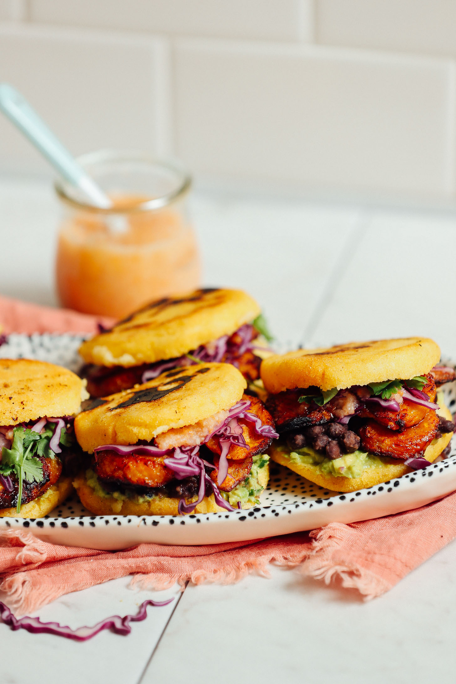 Pan-Seared Arepa Cakes with Black Bean and Avocado Salad