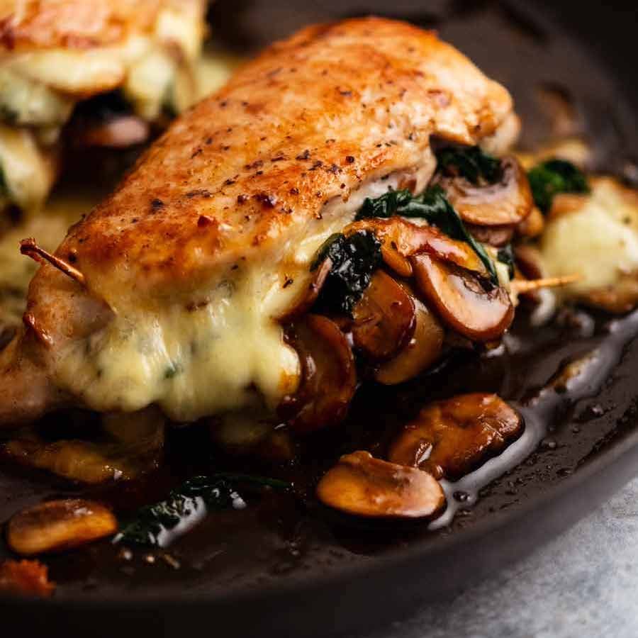 Cheese and Herb-Stuffed Chicken Breast with Creamy Mushroom Sauce