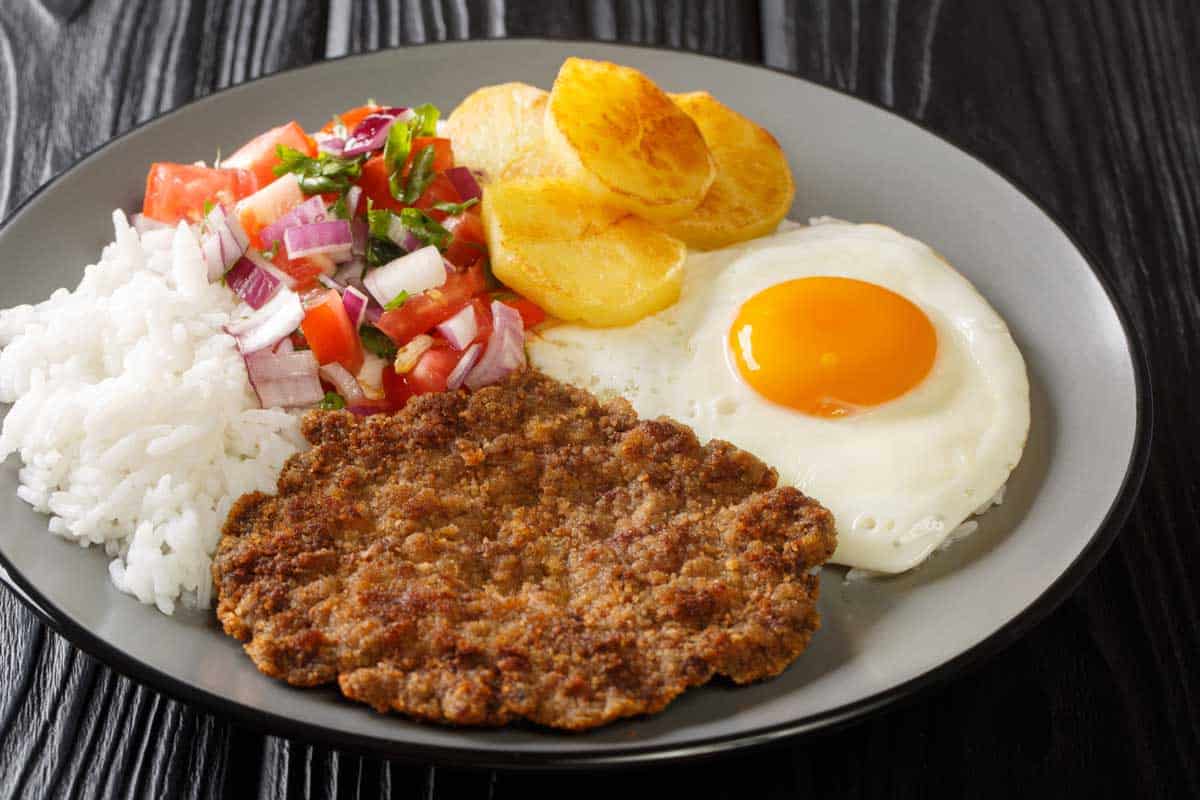 Pan-Fried Silpancho with Tomato and Potato Base