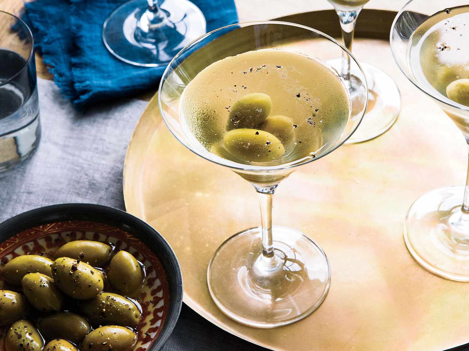 Stirred London Dry Gin Martini with Olive Garnish